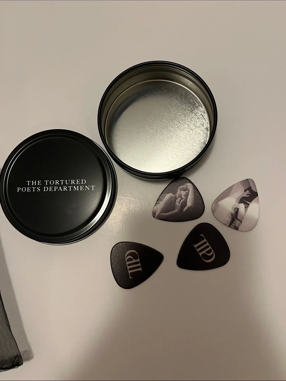 Taylor Swift Tortured Poets guitar picks and tin